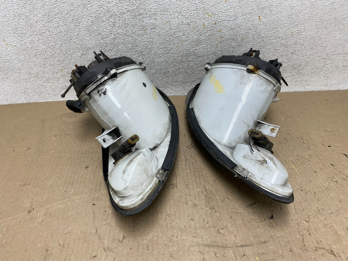 1996 to 1999 Mercury Sable Left+Right Side Set Halogen Headlights AH7690 DW8