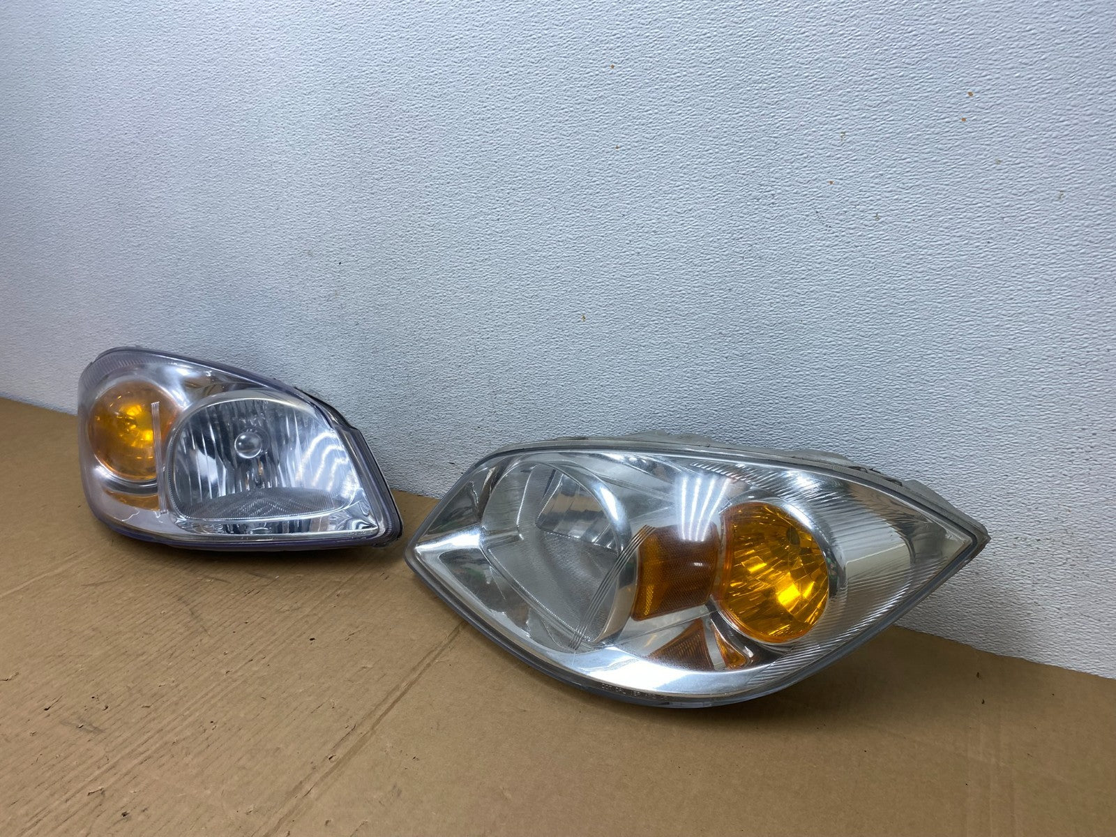 2005 - 2010 Chevrolet Cobalt Sedan Left+Right Set Headlights AC7552 DW1