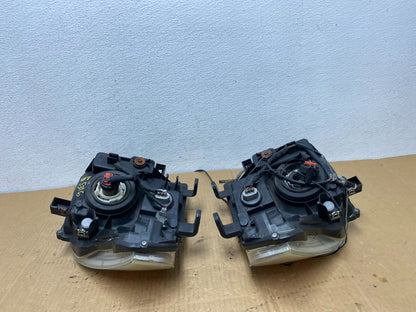 2005 2006 2007 Nissan Pathfinder Halogen Headlights Left+Right AC7720 DW9