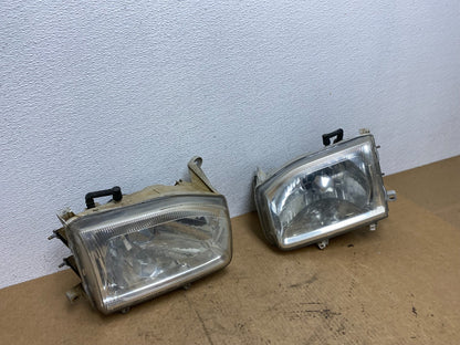 1999-2004 Nissan Pathfinder Left+Right Side Set Halogen Headlights Oem AC3402 DW2
