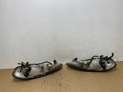1999 to 2005 Pontiac Grand Am Left+Right Set Headlights AG1428 DW7