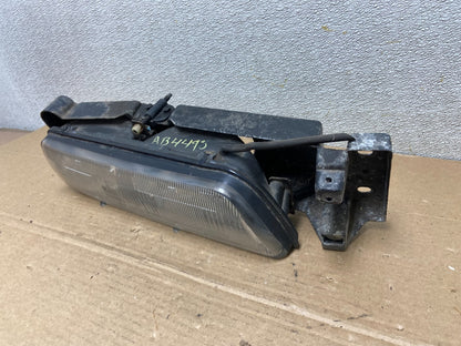 1989 to 1992 Pontiac Sunbird Right Passenger Side Headlight 16509426 AB44981