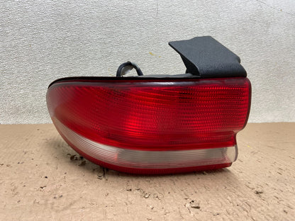 1993 to 1997 Chrysler Concorde Left Driver LH Side Tail Light OEM Y0566 GD0