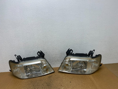 2005 to 2007 Mercury Mariner Left+Right Side Halogen Headlights AE1664 DW0