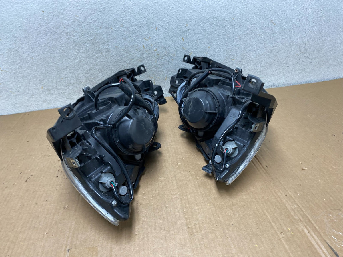 2008 to 2011 Subaru Impreza Left+Right Side Halogen Headlights TYC AI8815 DW9