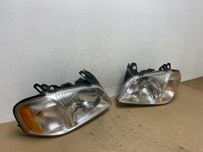 2001 2002 2003 2004 Mazda Tribute Left+Right Side Set Headlights AE9806 DW2