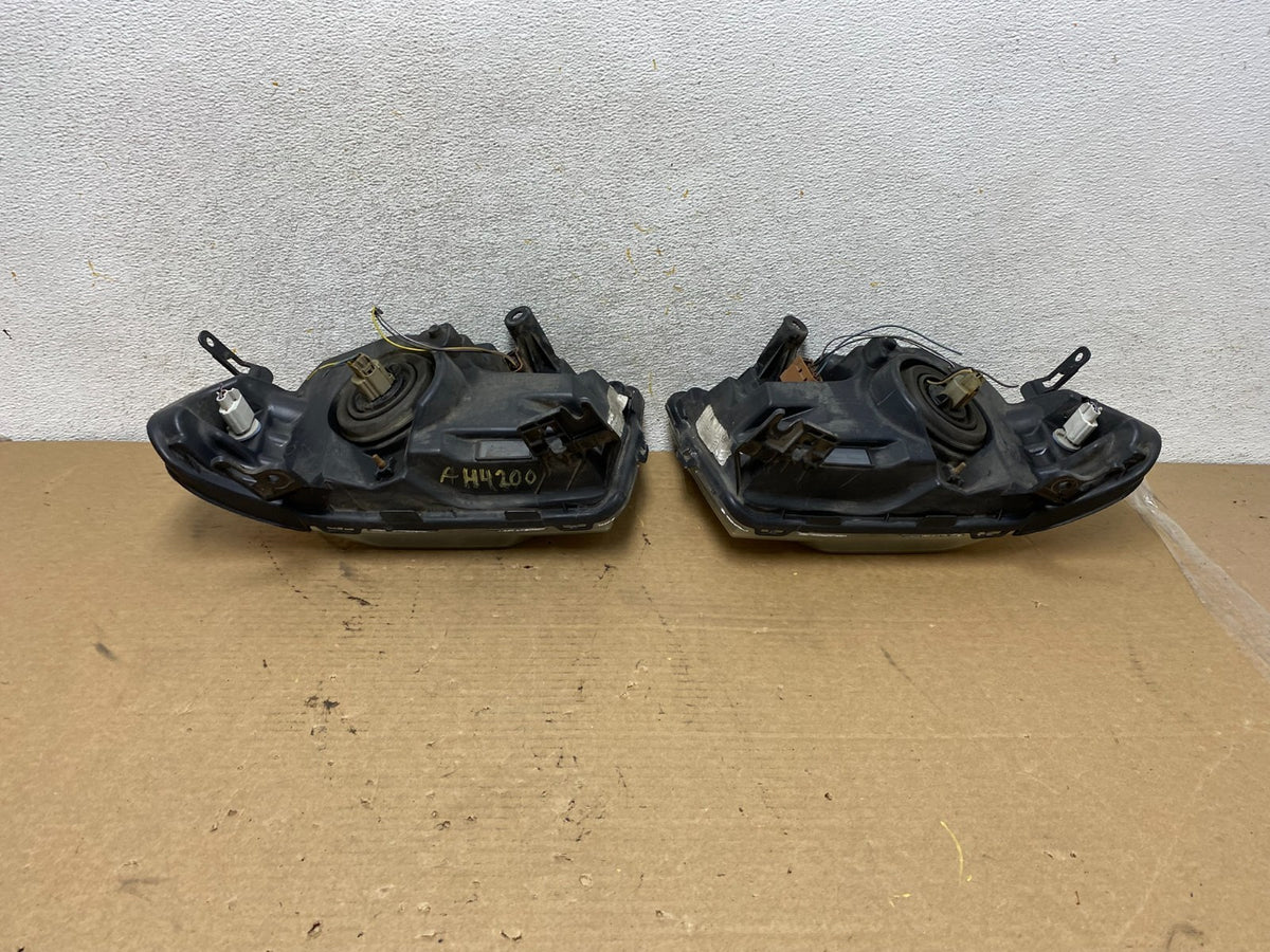 2008 to 2012 Ford Escape Headlights Left+Right Side Set Halogen AH4200 DW7