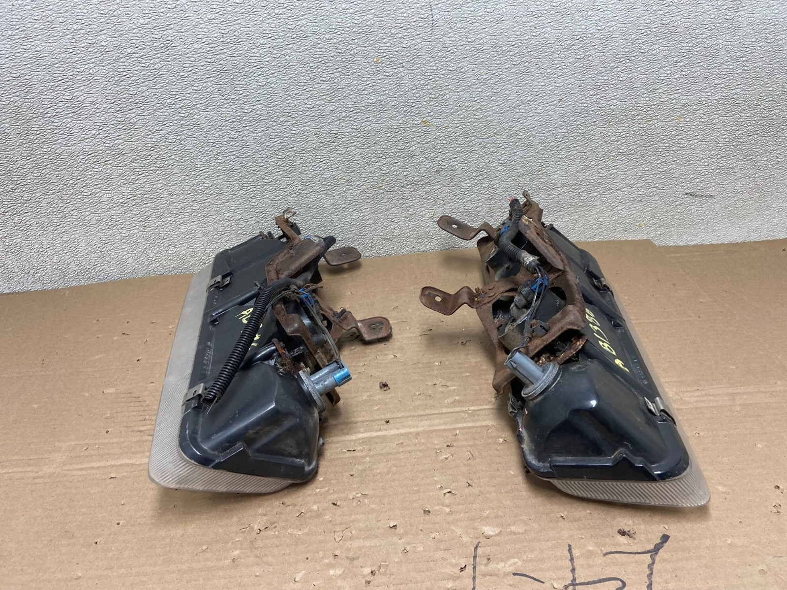 1991 to 1996 Saturn S Series Coupe Left Driver Side Headlights AB13866