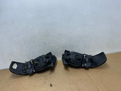 2004 - 2006 Nissan Sentra Halogen Left+Right Headlights AI8983 DW7