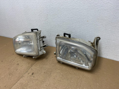 1999-2004 Nissan Pathfinder Left+Right Side Set Halogen Headlights AC6011 DW1