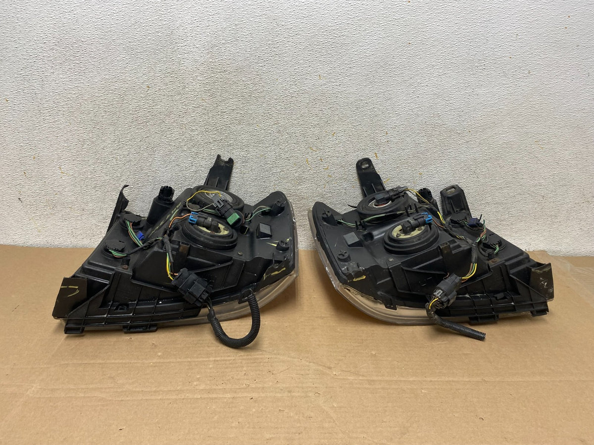 2007 - 2014 GMC Sierra Left+Right Side Halogen Headlights AH9340 DW17