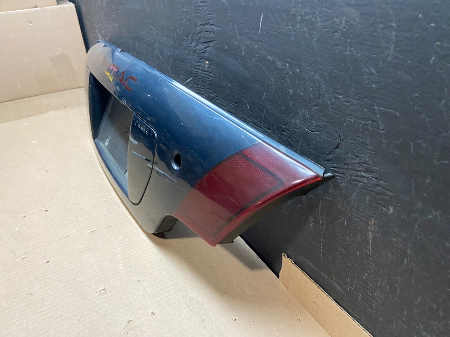 1995 to 1999 Pontiac Sunfire Center Rear Tail Light E8526 DG11