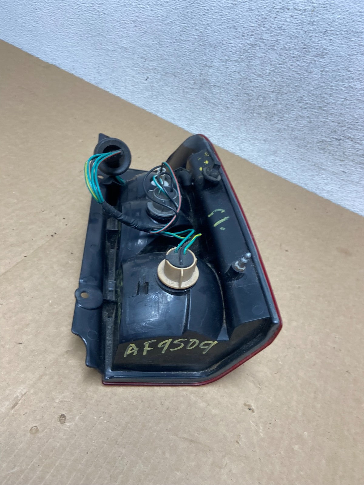 2002 2003 2004 Nissan Xterra Left Driver Side Tail Light AF9509 DW5