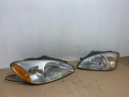 2000 to 2007 Ford Taurus Left+Right Side Halogen Headlights AF4231 LK2