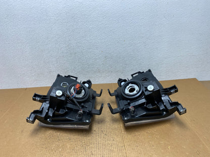 2005-2015 Nissan Xterra Driver Left+Right Side Set Headlights AE1364 DW7