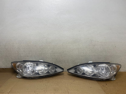 2005 to 2006 Toyota Camry Left+Right Side Set Halogen Headlights U2884 DW0