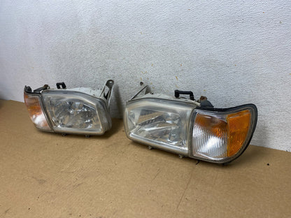1999-2004 Nissan Pathfinder Left+Right Side Set Halogen Headlights AI2646 DW1