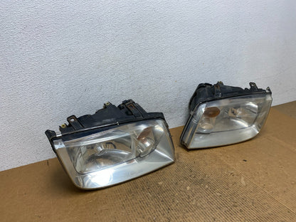 2002 to 2004 Volkswagen Jetta Left+Right Headlights AE2623 DW2