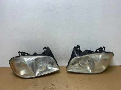 2001 2002 2003 2004 Mazda Tribute Left+Right Side Set Headlights AG2406 DW0