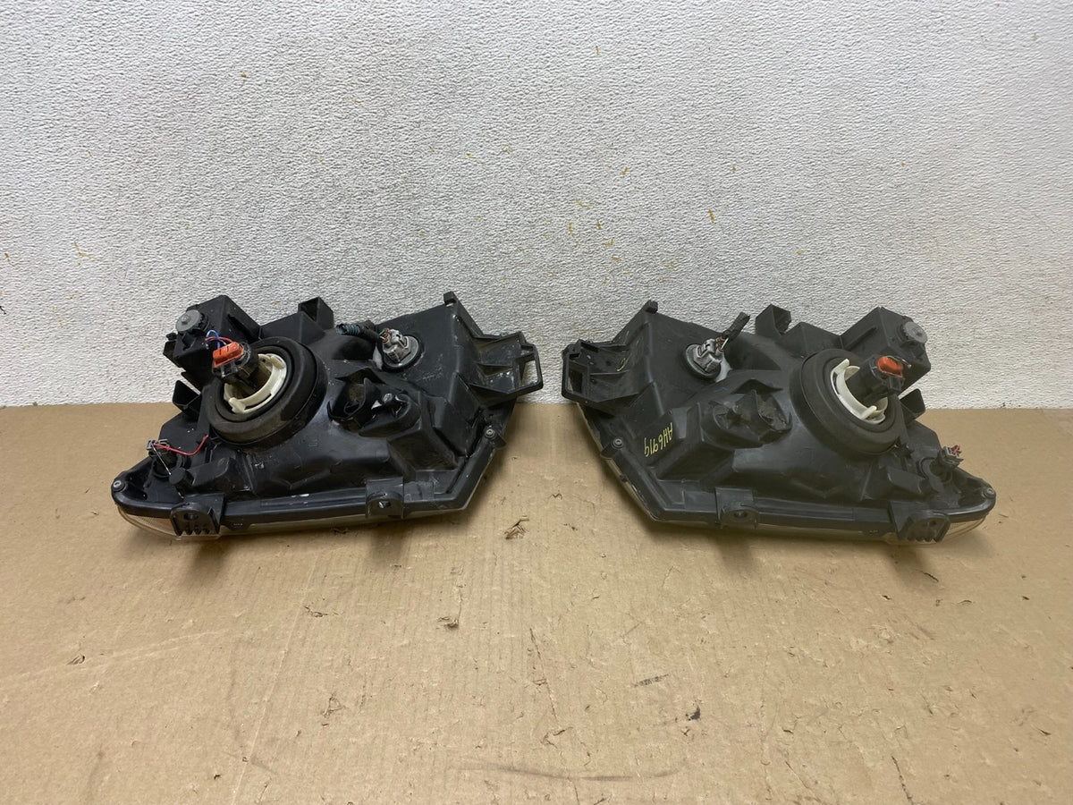 2005-2015 Nissan Xterra Driver Left+Right Side Set Headlights AH6919 DW7