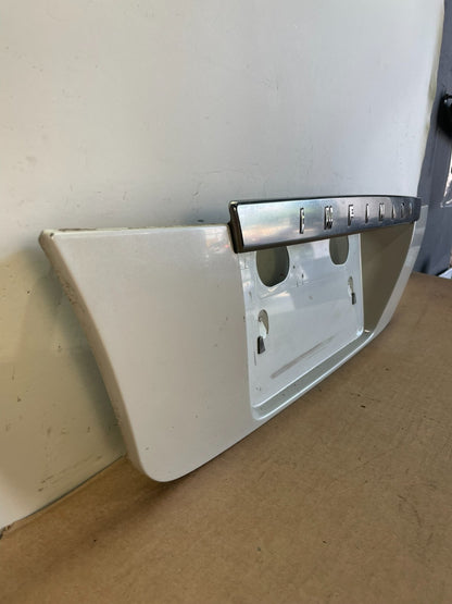 2002 2003 2004 Infiniti I35 Trunk Lid Rear License Plate Garnish AF8800 DG2
