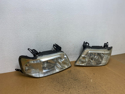 2005 to 2007 Mercury Mariner Left+Right Side Halogen Headlights AE1664 DW2
