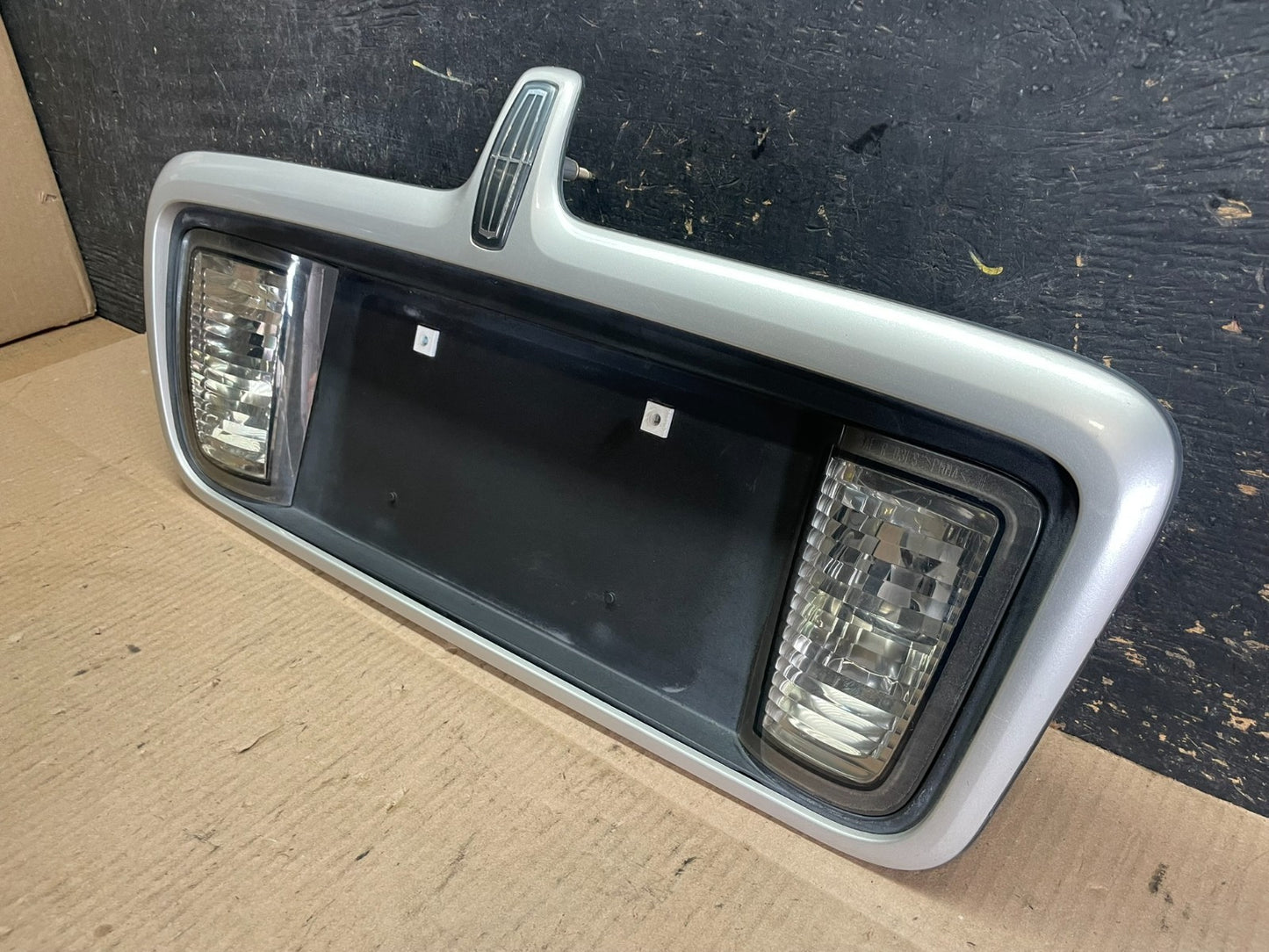 2003 to 2006  Lincoln LS Rear License Plate Trim Panel OEM Z8521 DG2