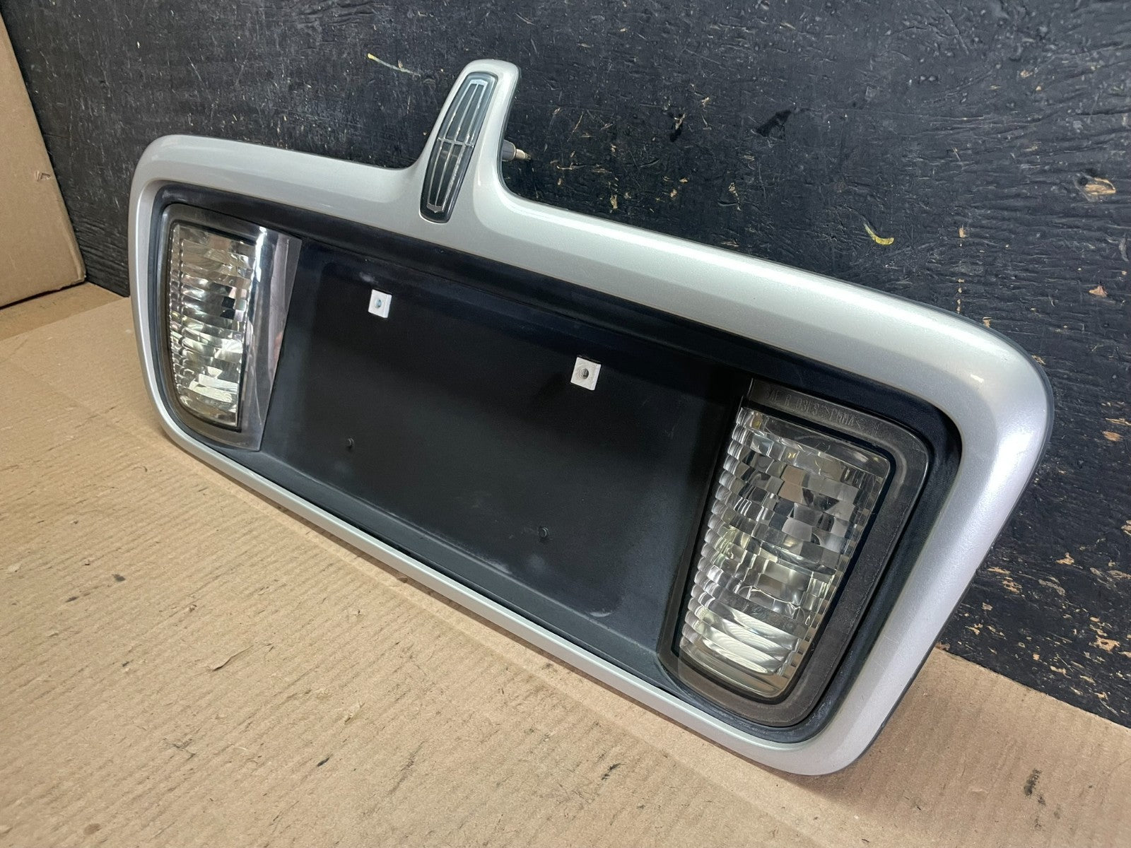 2003 to 2006  Lincoln LS Rear License Plate Trim Panel OEM Z8521 DG2