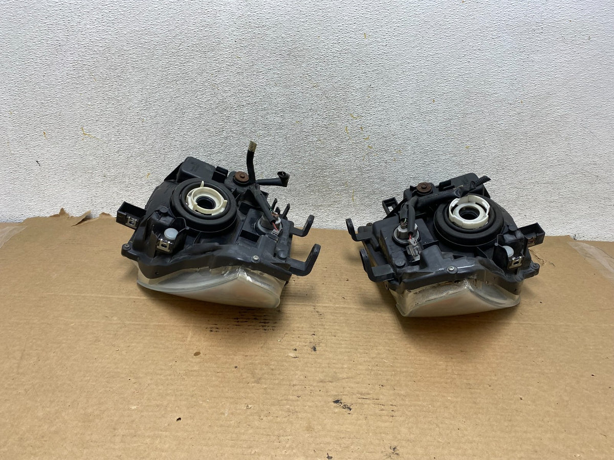 2005 2006 2007 Nissan Pathfinder Halogen Headlights Left+Right AH4041 DW9