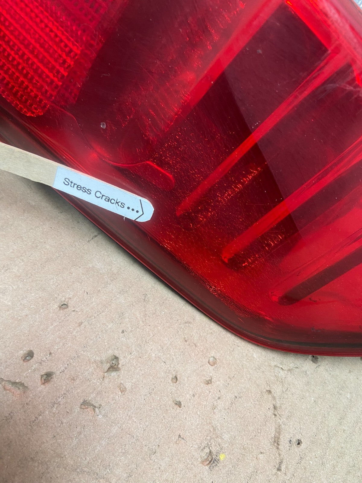 2005 to 2014 Nissan Frontier Left Driver LH Side Tail light Oem AA0539 DW4