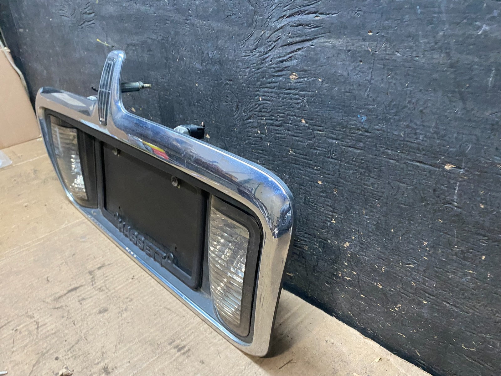 2003 to 2006  Lincoln LS Rear License Plate Trim Panel OEM t4133 DG1