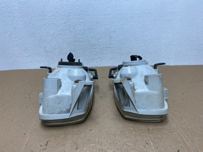 1999-2004 Nissan Pathfinder Left+Right Side Set Halogen Headlights AC5823 DW8