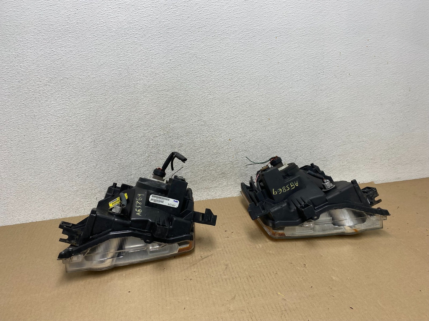 2005-2015 Nissan Xterra Driver Left+Right Side Set Headlights AG5869 DW6