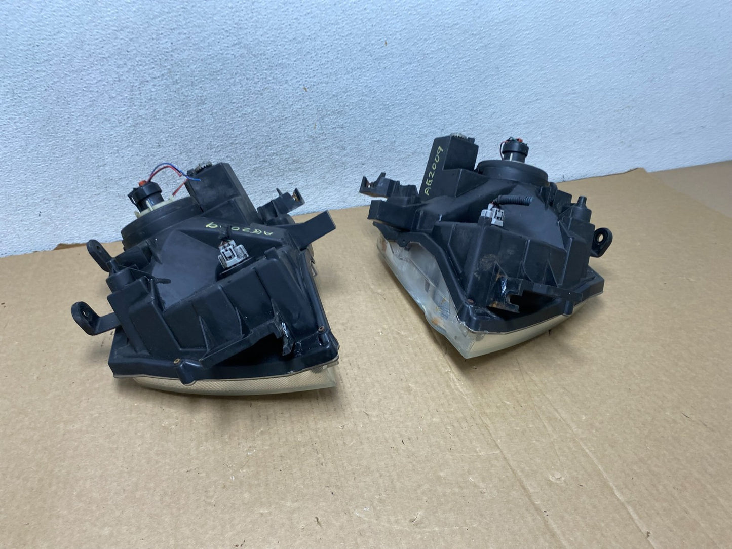 2005-2015 Nissan Xterra Driver Left+Right Side Set Headlights AG2009 DW11