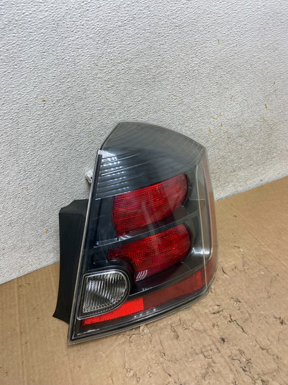 2007 to 2012 Nissan Sentra Right Passenger Rh Black Tail Light AI9260 LK2