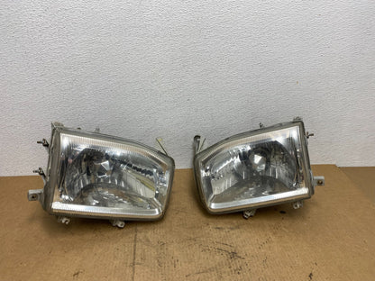 1999-2004 Nissan Pathfinder Left+Right Side Set Halogen Headlights AC3403 DW0
