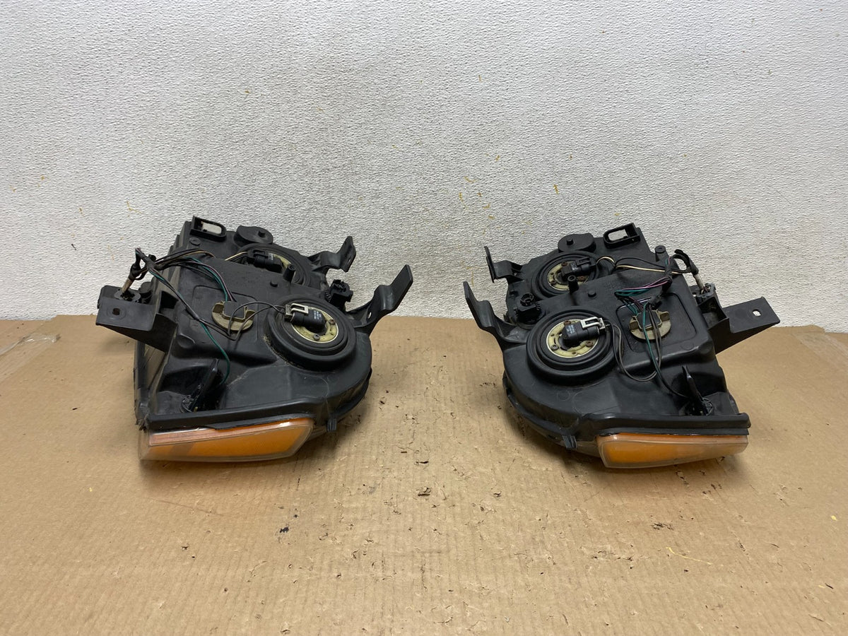 2008-2010 Jeep Grand Cherokee Left+Right Set Halogen Headlights AH5957 DW11