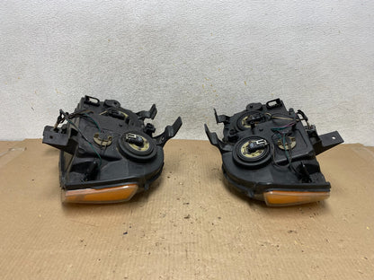 2008-2010 Jeep Grand Cherokee Left+Right Set Halogen Headlights AH5957 DW11
