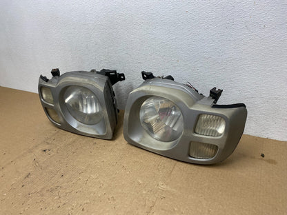 2002 2003 2004 Nissan Xterra Left+Right Side Headlights AF9868 DW1