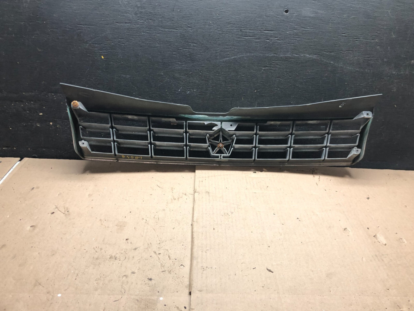 1989 to 1994 Plymouth Sundance Front Chrome Grill 4451502 N02582