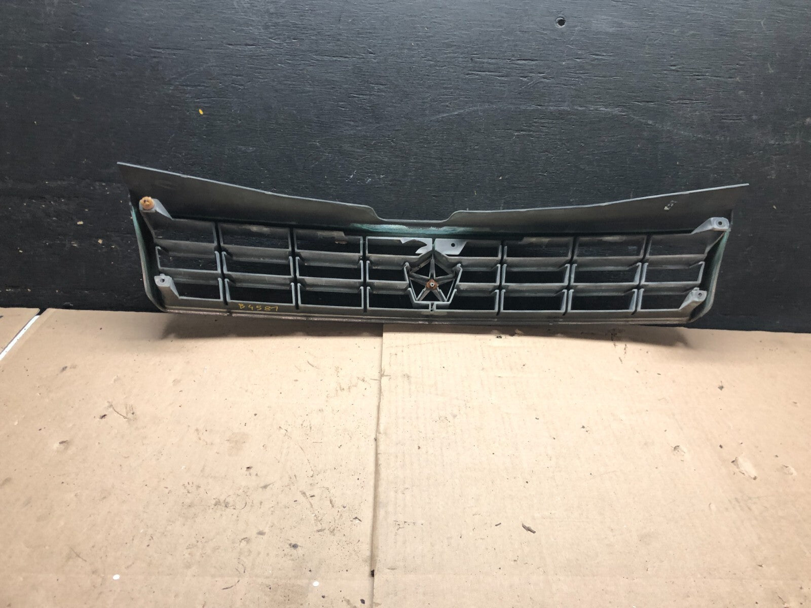 1989 to 1994 Plymouth Sundance Front Chrome Grill 4451502 N02582