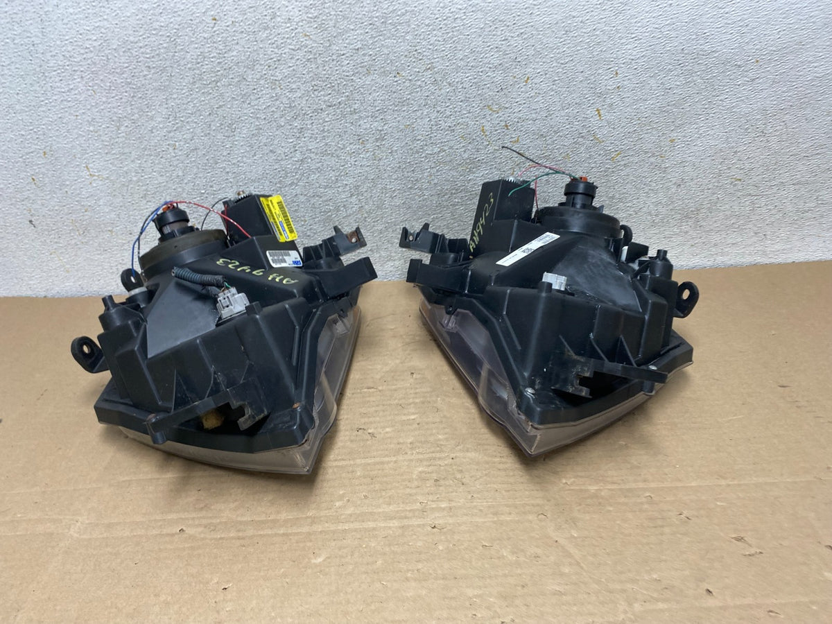 2005-2015 Nissan Xterra Driver Left+Right Side Set Headlights DEPO AH9423 DW10