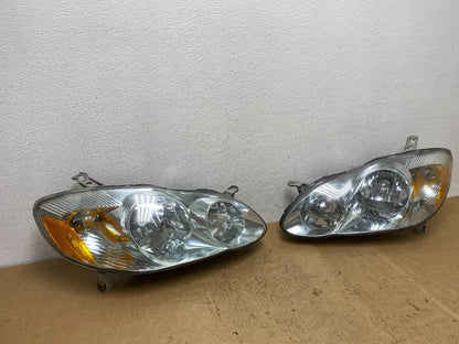2003 to 2004 Toyota Corolla Left+Right Side Set Headlights AD0645 DW2