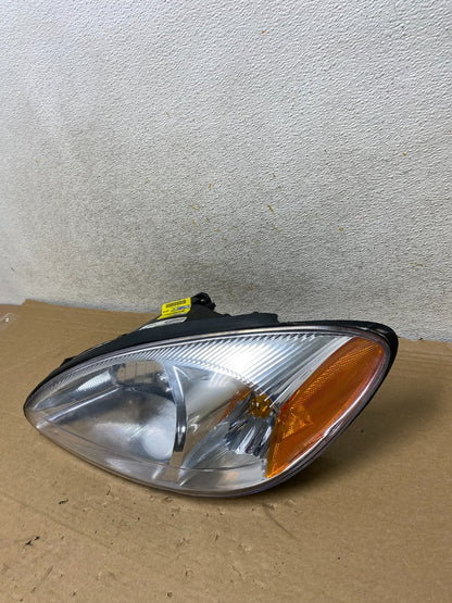 2000 to 2007 Ford Taurus Left Driver LH Side Halogen Headlight TYC AH8257 DW1