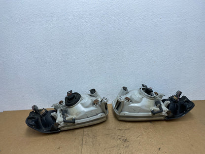1999-2004 Nissan Pathfinder Left+Right Side Set Halogen Headlights Oem AC3404 DW6