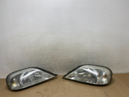 2000 to 2005 Mercury Sable Left+Right Side Halogen Headlights AJ2144 DW0