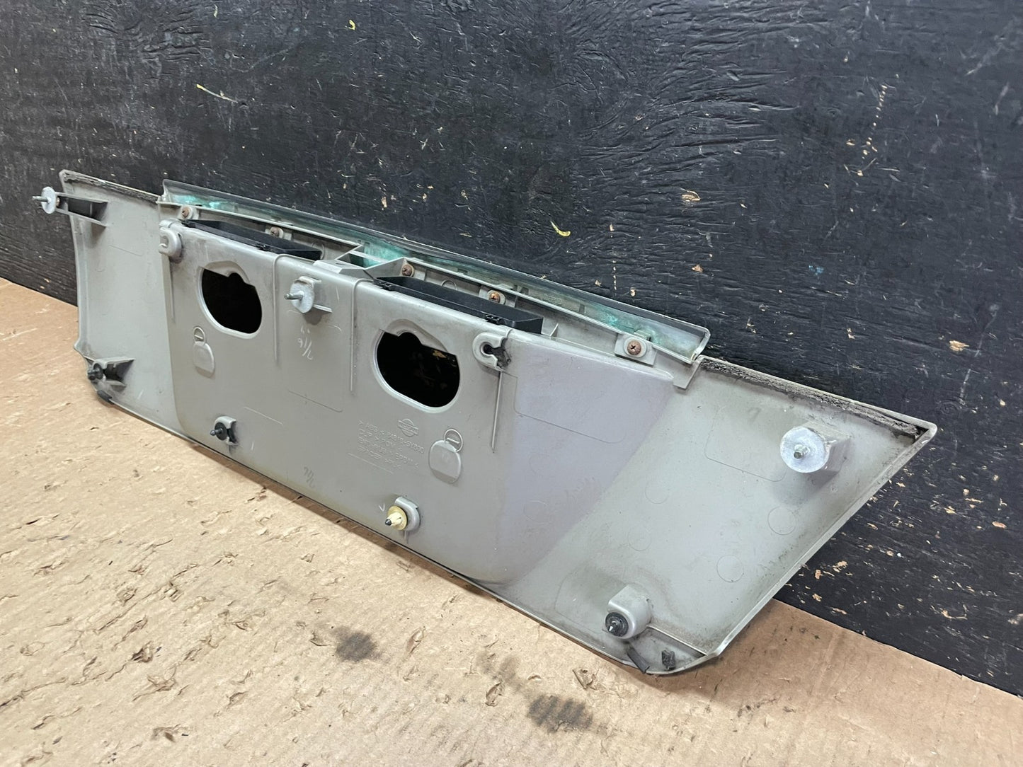 2002 2003 2004 Infiniti I35 Trunk Lid Rear License Plate Garnish OEM Z5598 DG9