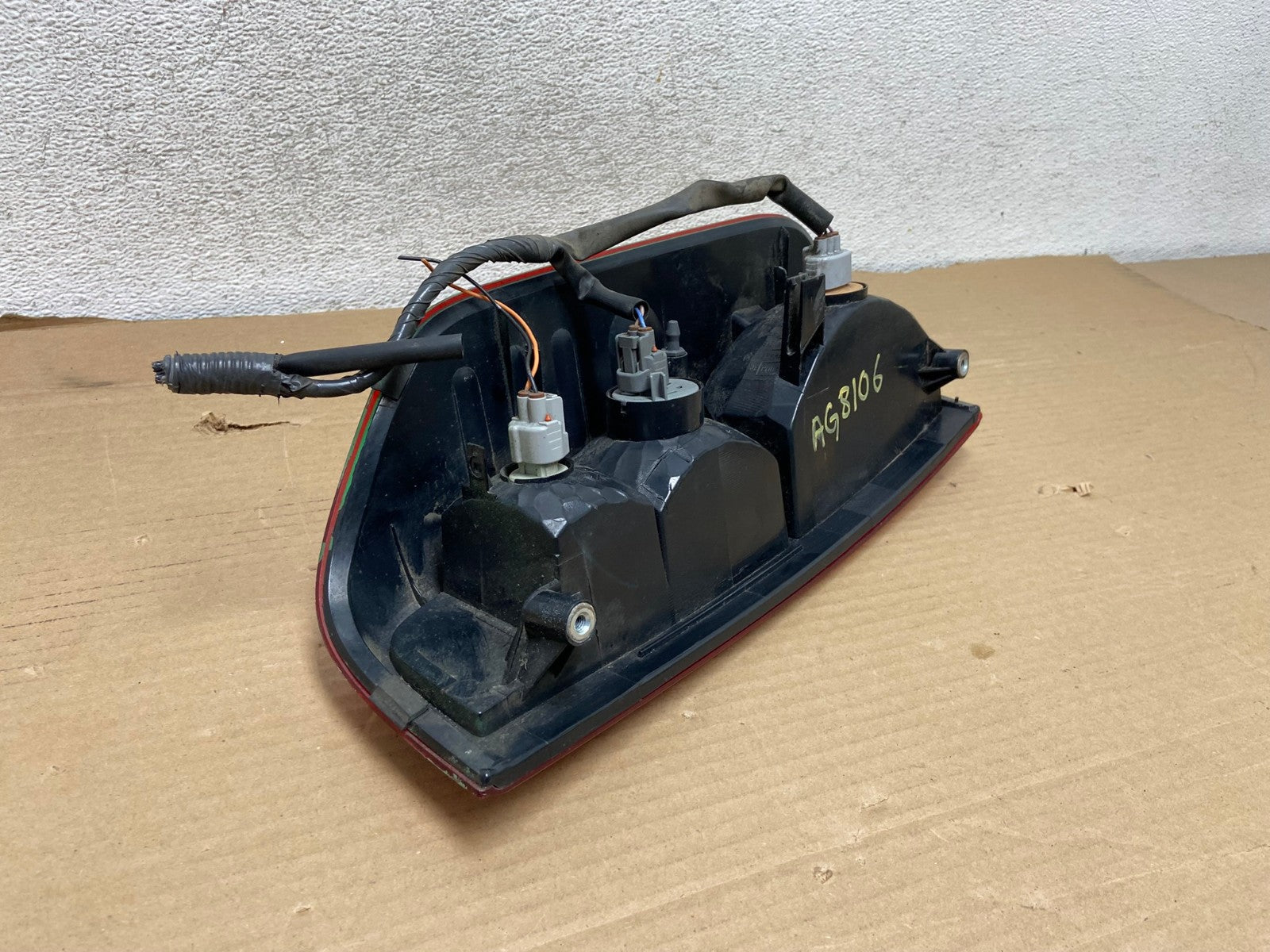 2005 to 2014 Nissan Frontier Right Passenger RH Side Tail light AG8106 LK4