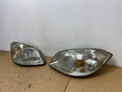 2005 - 2010 Chevrolet Cobalt Sedan Left+Right Headlights AD4374 DW1