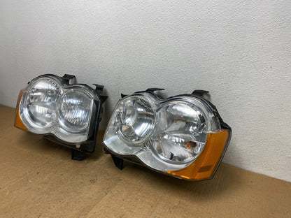 2008-2010 Jeep Grand Cherokee Left+Right Set Halogen Headlights AD0656 DW1